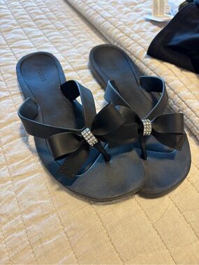 GUESS Black Bow Thong Sandals with Rhinestone Accent